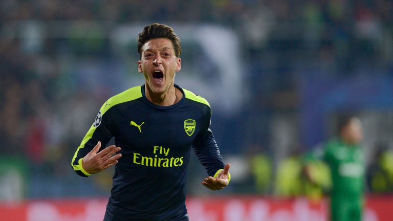 Arsenals German midfielder Mesut Ozil celebrates after scoring a goal during the UEFA Champions League Group A football match between PFC Ludogorets and Ar