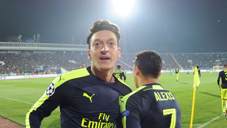 Mesut Ozil celebrates after scoring against Ludogorets