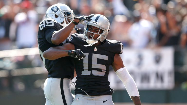 OAKLAND, CA - SEPTEMBER 20:  Michael Crabtree #15 of the Oakland Raiders celebrates a touchdown in the third quarter with Amari Cooper #89 of the Oakland R