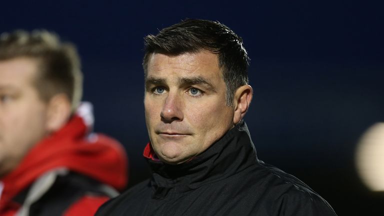 NORTHAMPTON, ENGLAND - JANUARY 09:  Milton Keynes Dons coach Richie Barker looks on during The Emirates FA Cup Third Round match between Northampton Town a