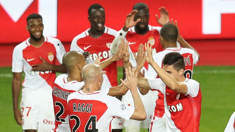 Monaco's Argentinian forward Guido Carrillo (R) celebrates with teammates after scoring a goal during the French L1 football match Monaco (ASM) vs Nancy (A