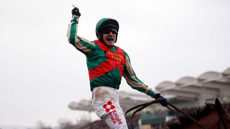 Tom Scudamore celebrates his victory on Moon Racer in the Weatherbys Champion Bumper in 2015.