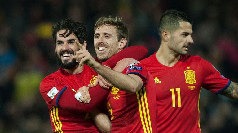 Spain's defender Nacho Monreal (C) celebrates with teammates after scoring in the World Cup Qualifier against Macedona