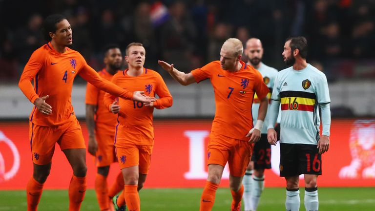 AMSTERDAM, NETHERLANDS - NOVEMBER 09:  Davy Klaassen of the Netherlands (7) celebrates with Virgil van Dijk (4) as he scores their first goal from a penalt
