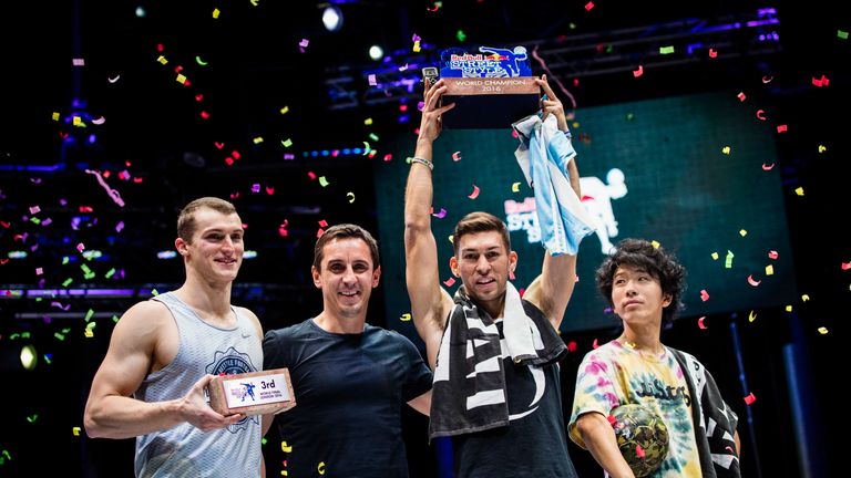 (L to R) Anatoly Yanchev of Russia 3rd place, guest judge Gary Neville of Great Britain, Carlos Alberto Iacono of Argentina 1st place