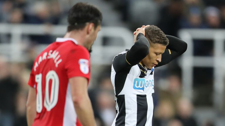 Newcastle United's Dwight Gayle (right) after missing a chance 