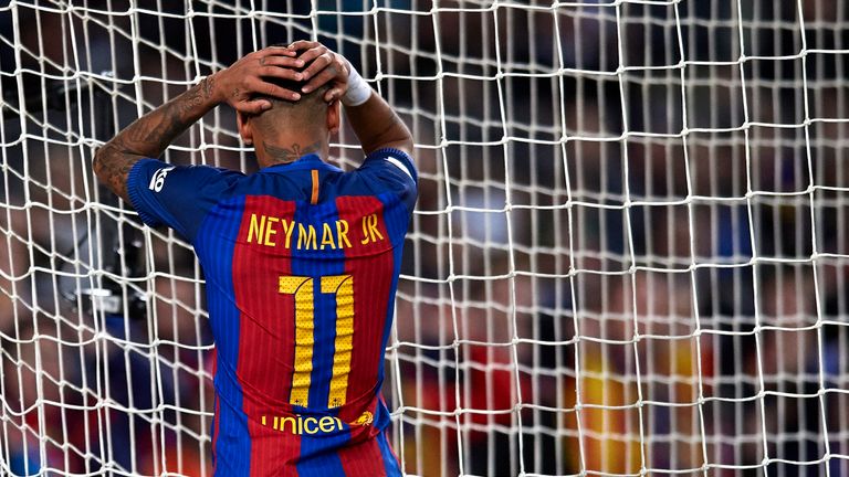 Neymar reacts as he fails to score during the La Liga match against Malaga