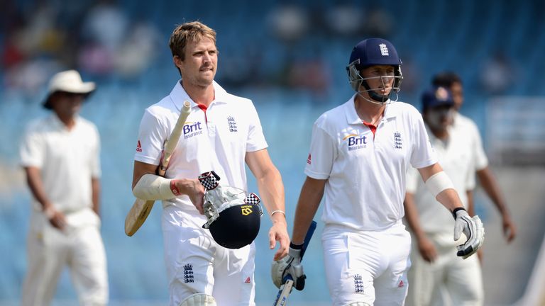 MUMBAI, INDIA - NOVEMBER 05:  Nick Compton and Joe Root of England leave the field for lunch during day three of the tour match between Mumbai A and Englan
