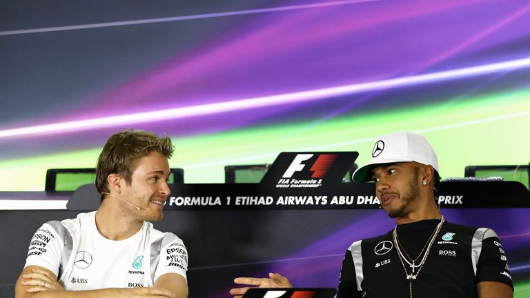 Nico Rosberg and Lewis Hamilton talk during a press conference prior to the Abu Dhabi Grand Prix