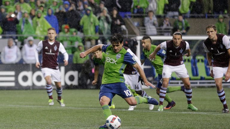 SEATTLE, WA - NOVEMBER 22: Nicolas Lodeiro #10 of the Seattle Sounders scores a goal on a penalty kick during the second half of a match in the first leg o
