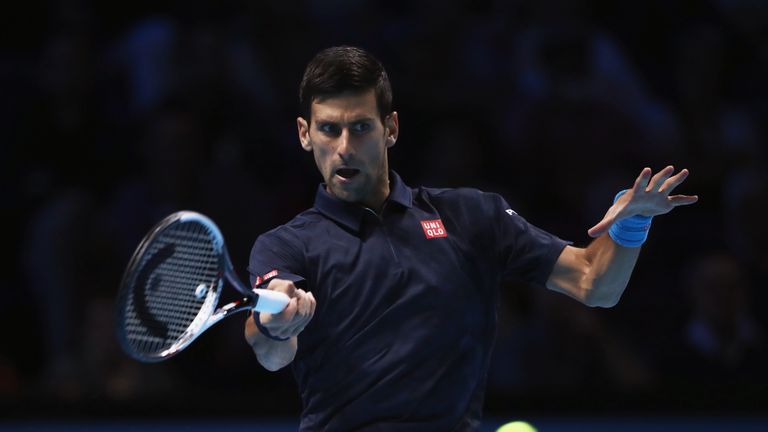 Novak Djokovic plays a forehand