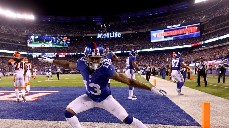 EAST RUTHERFORD, NJ - NOVEMBER 14:  Odell Beckham Jr. #13 of the New York Giants celebrates after scoring a touchdown against the Cincinnati Bengals during