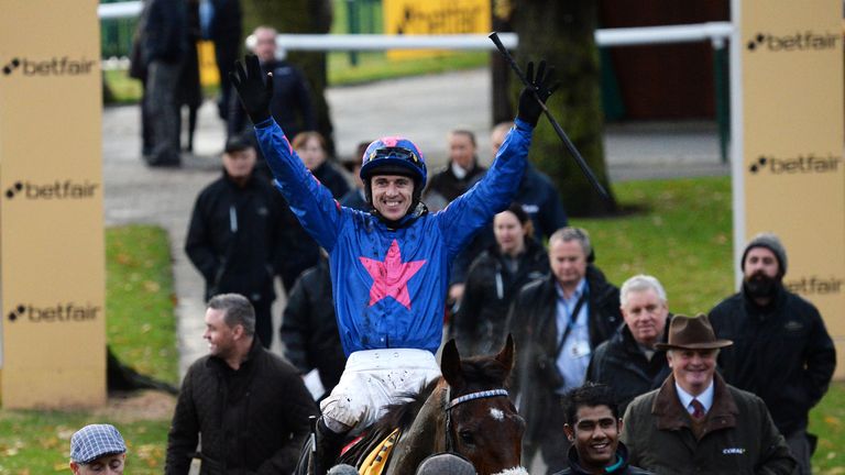 Paddy Brennan celebrates after riding Cue Card