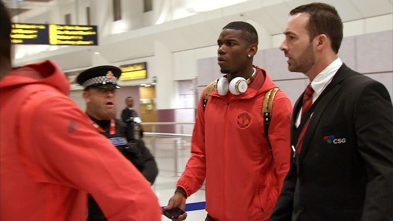 Paul Pogba limps through Manchester Airport after returning from Istanbul