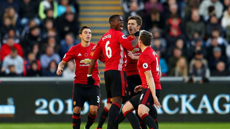 Paul Pogba celebrates Manchester United's first goal against Swansea
