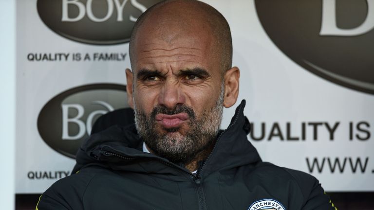Manchester City's Spanish manager Pep Guardiola awaits kick-off in the English Premier League football match between Burnley and Manchester City at Turf Mo