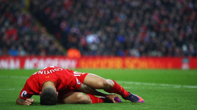 Philippe Coutinho lies injured during the Premier League match between Liverpool and Sunderland