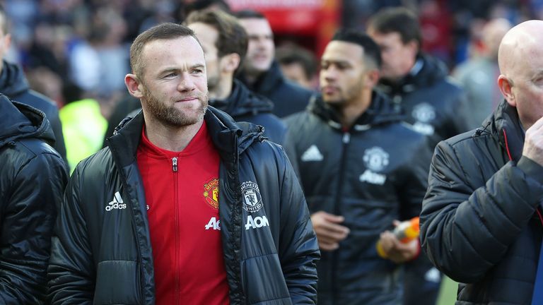 Wayne Rooney walks out ahead of the match against Arsenal at Old Trafford