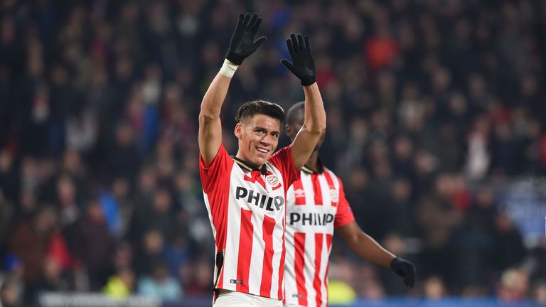 PSV Eindhoven's Mexican defender Hector Moreno reacts at the end of the UEFA Champions League round of 16 first leg football match between PSV Eindhoven an