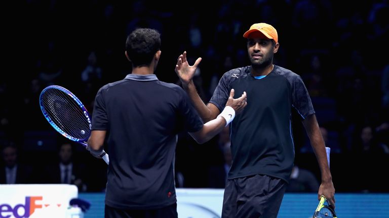 LONDON, ENGLAND - NOVEMBER 19:  Rajeev Ram of the United States and Raven Klaasen of South Africa celebrate after scoring a point during their men's double