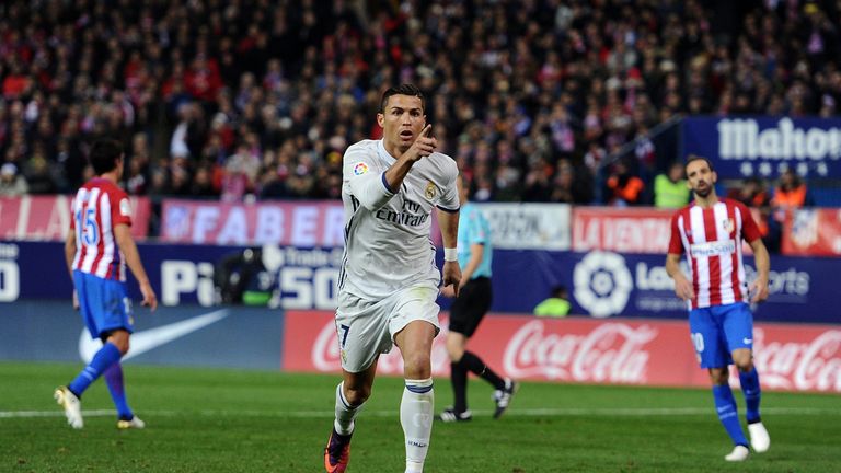 Cristiano Ronaldo of Real Madrid celebrates after scoring Real's 2nd goal during the La Liga match against Atletico Madrid
