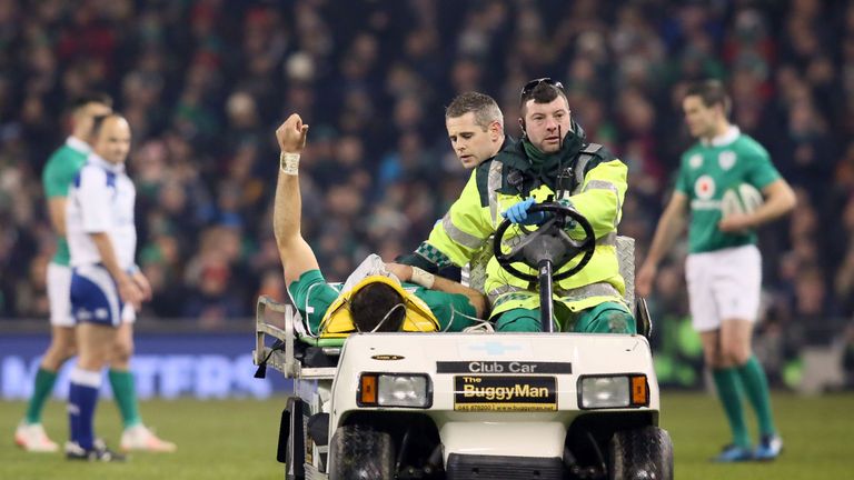 Ireland's centre Robbie Henshaw is carted off with concussion during the defeat to New Zealand