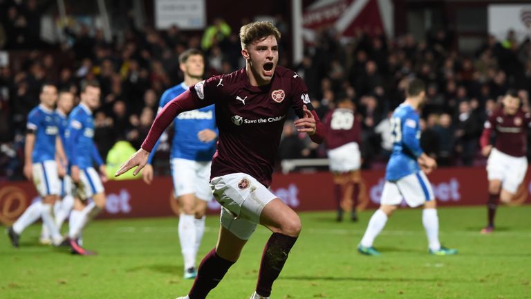 Robbie Muirhead celebrates after putting Hearts ahead