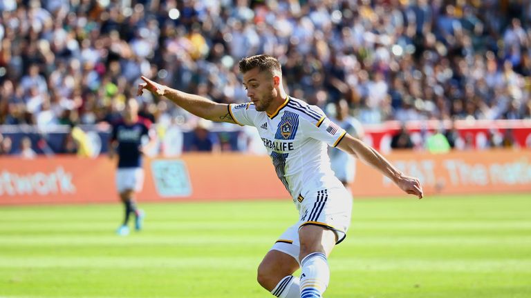 LOS ANGELES, CA - DECEMBER 07:  Robbie Rogers #14 of the Los Angeles Galaxy controls the ball on the attack against the New England Revolution during 2014 