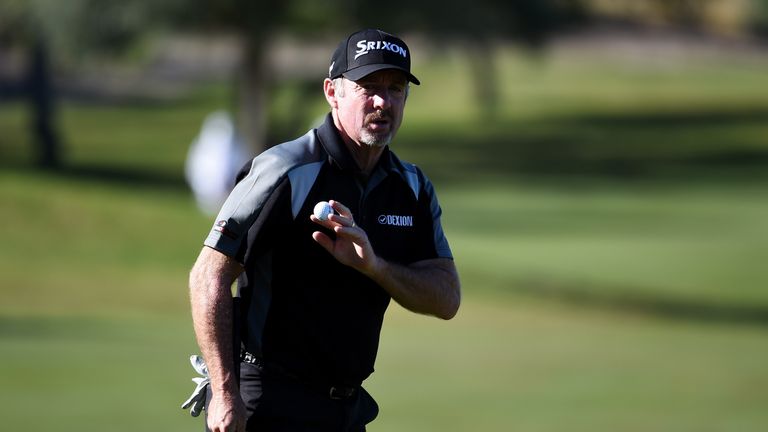 Rod Pampling of Australia reacts after putting for birdie on the 11th hole 