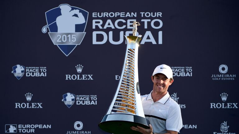 DUBAI, UNITED ARAB EMIRATES - NOVEMBER 22:  Rory McIlroy of Northern Ireland with the Race to Dubai Trophy after the final round of the DP World Tour Champ