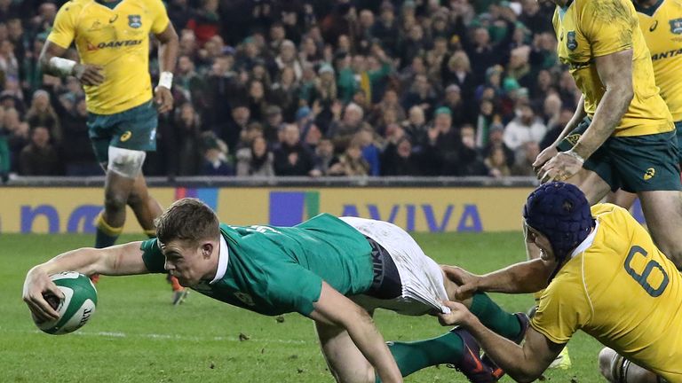 Australia flanker Dean Mumm cannot prevent Garry Ringrose from scoring Ireland's second try