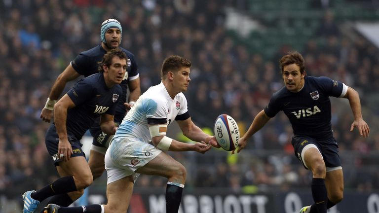 Owen Farrell passes the ball during England's win over Argentina in November 2013