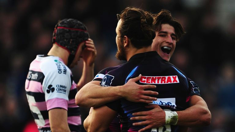 Michele Campagnaro of Exeter Chiefs (back) celebrates his try with Tom Hendrickson