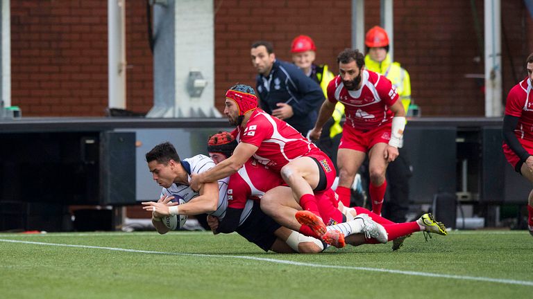 Scotland wing Sean Maitland dives over to score their third try