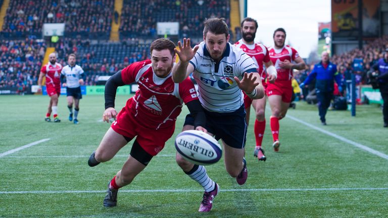 Tommy Seymour (right) touches the ball down to score Scotland's first try against Georgia