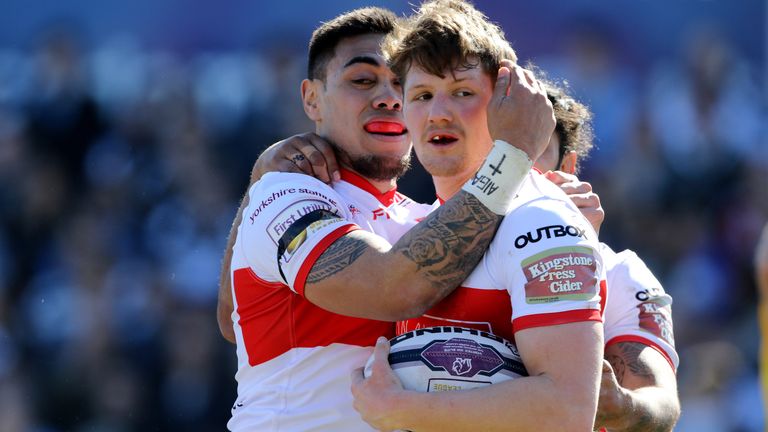 Hull KR's Ryan Shaw celebrates a try with Ken Sio