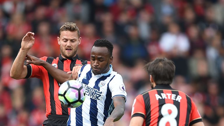 Simon Francis and Harry Arter combine to stop Saido Berahino at the Vitality Stadium