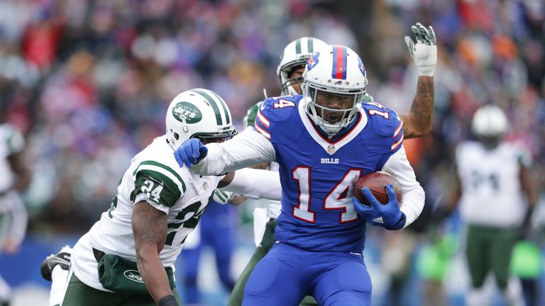 ORCHARD PARK, NY - JANUARY 03:  Sammy Watkins #14 of the Buffalo Bills breaks a tackle by Darrelle Revis #24 of the New York Jets during the second half at