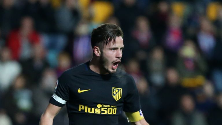 Atletico Madrid's Argentinian midfielder Saul Niguez celebrates after scoring during the Spanish Copa del Rey (King's Cup) round of 32 first leg football m