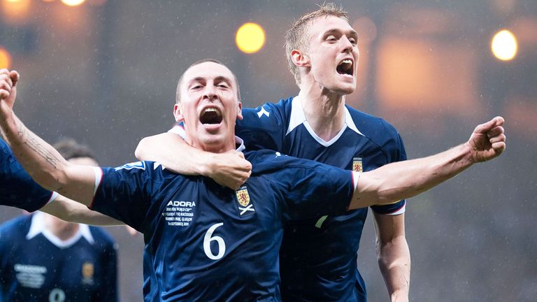 Scott Brown (6) and Darren Fletcher celebrate a Scotland goal in 2007