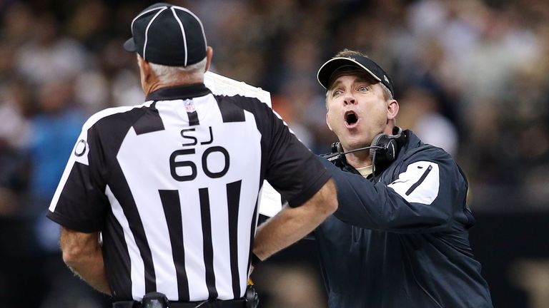 NEW ORLEANS, LA - DECEMBER 06:  New Orleans Saints head coach Sean Payton argues with Side Judge Gary Cavaletto after a call during their game agaisnt the 