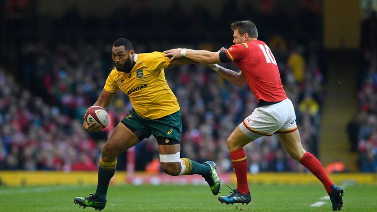  Sekope Kepu of Australia hands off Dan Biggar of Wales 