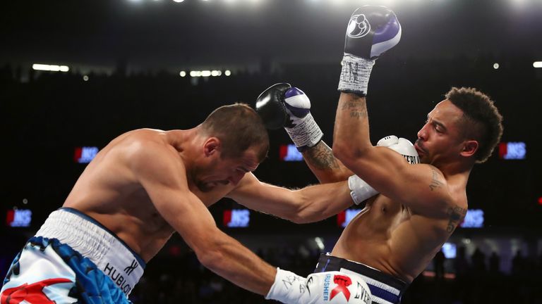 Andre Ward and Sergey Kovalev of Russia trade punches during the first round