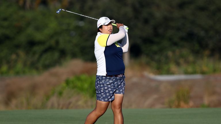 NAPLES, FL - NOVEMBER 17:  Shanshan Feng of China plays her second shot on the 18th hole during the first round of the CME Group Tour Championship at Tibur
