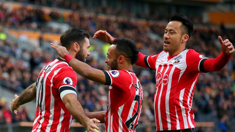 Charlie Austin is congratulated after scoring a penalty against Hull