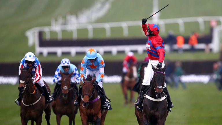 Nico de Boinville celebrates on board Sprinter Sacre after winning the Betway Queen Mother Champion Chase