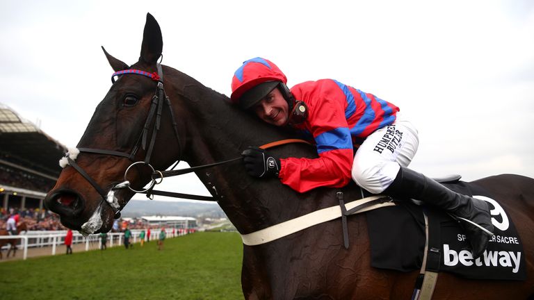 Nico de Boinville celebrates on board Sprinter Sacre after winning the Betway Queen Mother Champion Chase
