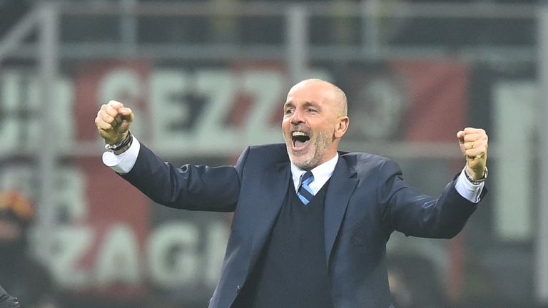 Inter Milan's coach Stefano Pioli celebrates during the Italian Serie A football match AC Milan Vs Inter Milan on November 20, 2016 at the 'San Siro Stadiu
