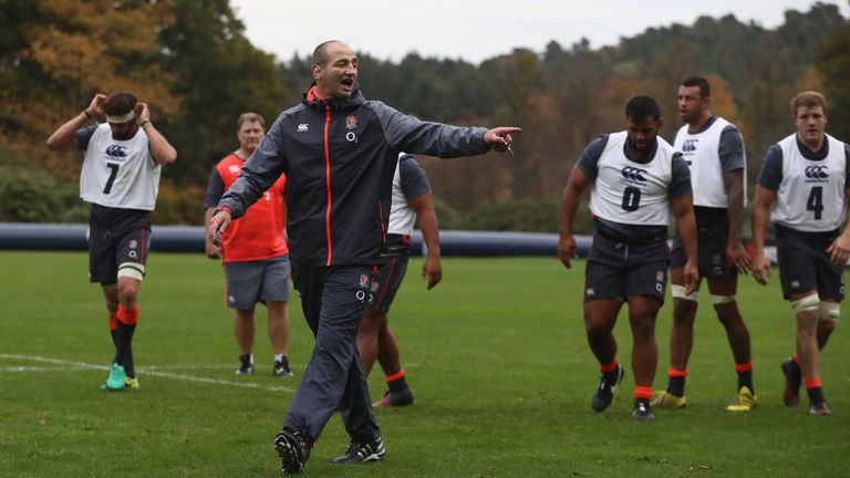 Steve Borthwick takes the England forwards through a session at their Pennyhill Park training base