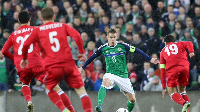 Northern Ireland's Steven Davis battles for the ball with Azerbaijan's Rahid Amirguliyev during the 2018 FIFA World Cup qualifying, Group C match at Windso